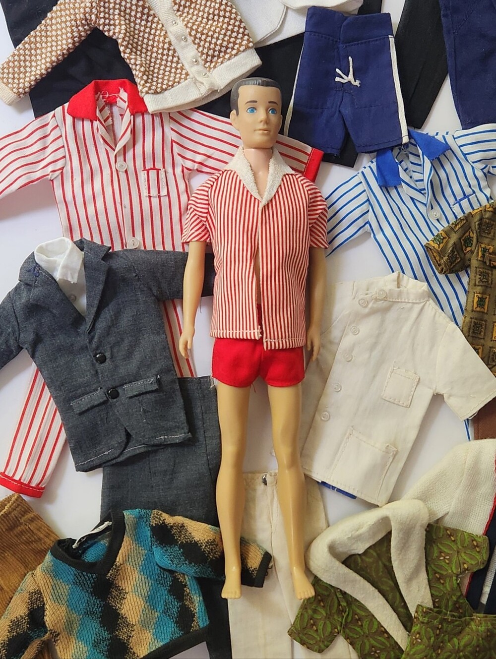 Vintage Barbie Ken doll with clothing